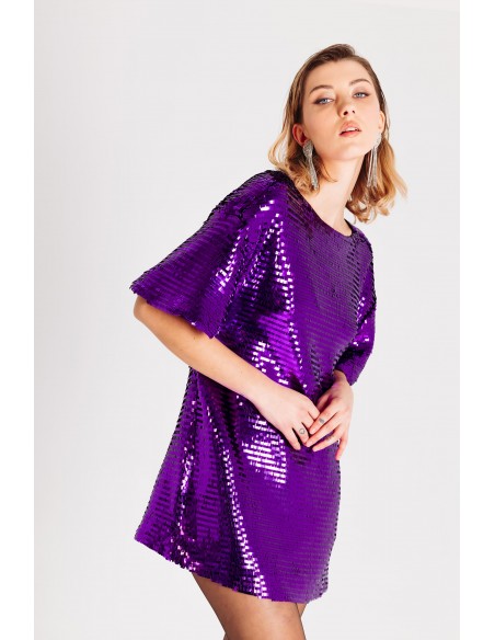 Abito corto in paillettes con scollo sul dietro