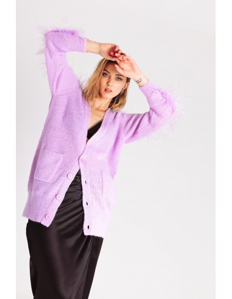 Cardigan with feathers along the arms and pockets